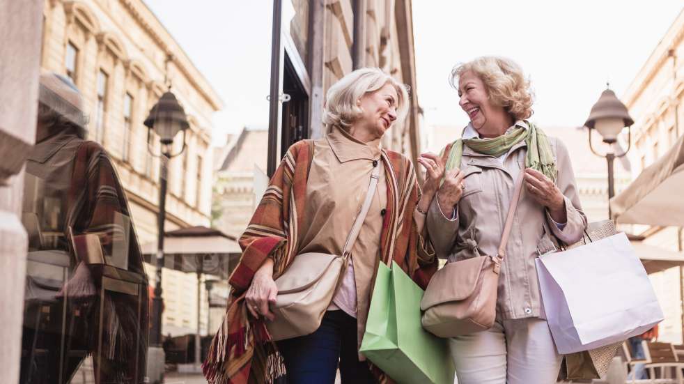 Two senior women shopping
